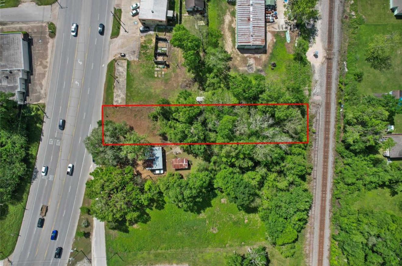 Tbd Tbd Us-90 Liberty, TX 77575 - Photo 3 of 4 an aerial view of residential house with outdoor space and trees all around