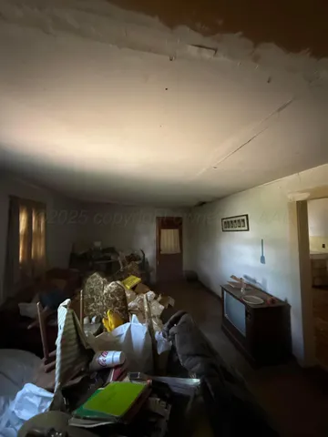 a bedroom with a bed and cabinets