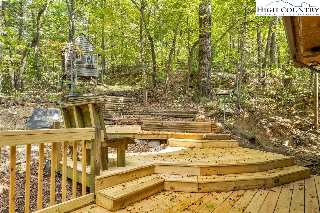 418 Wild Turkey Road Ferguson, NC 28624 - Photo 8 of 50 a view of swimming pool with outdoor seating