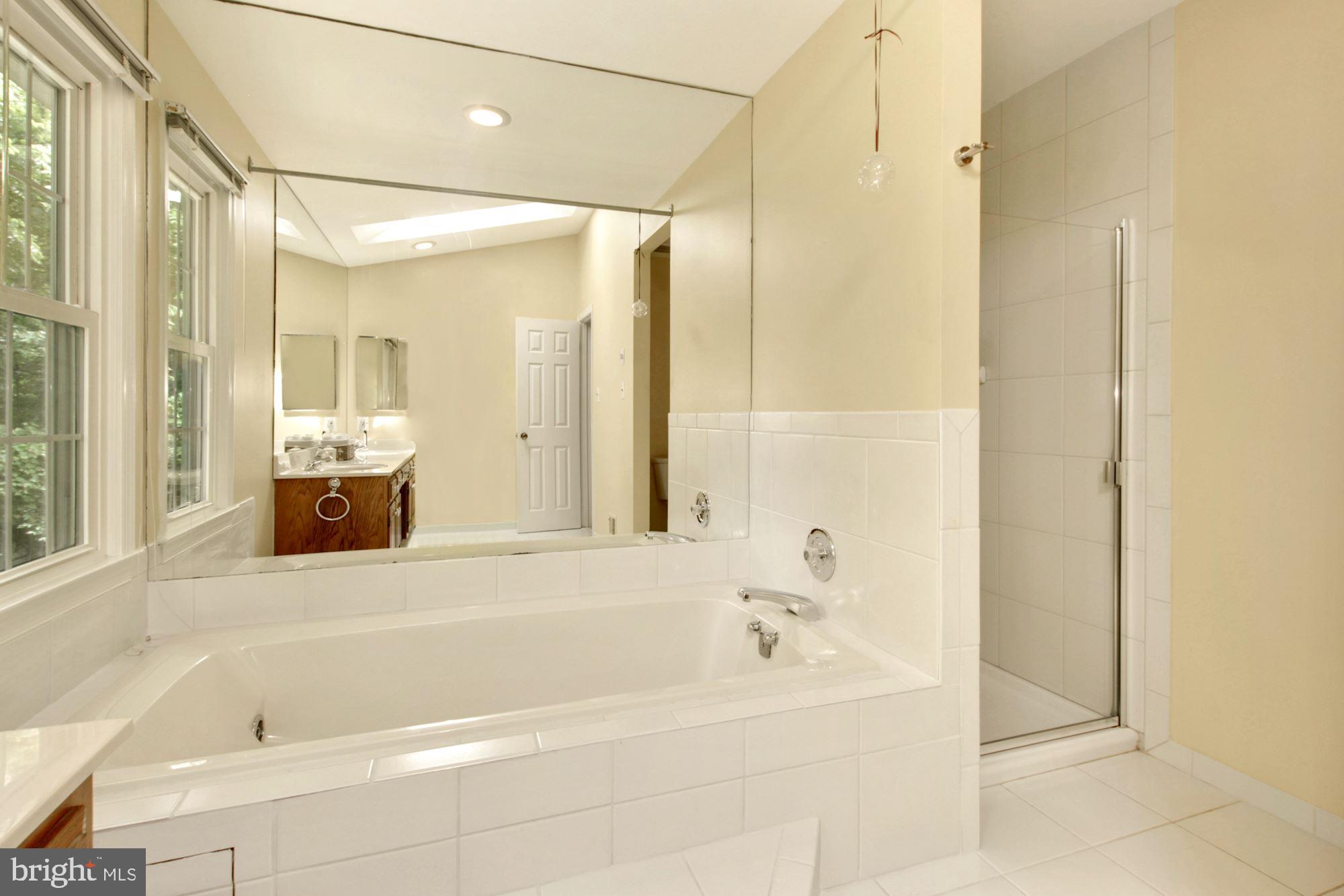 15309 Watergate Road Silver Spring, MD 20905 - Photo 22 of 43 Primary bathroom with large soaking tub