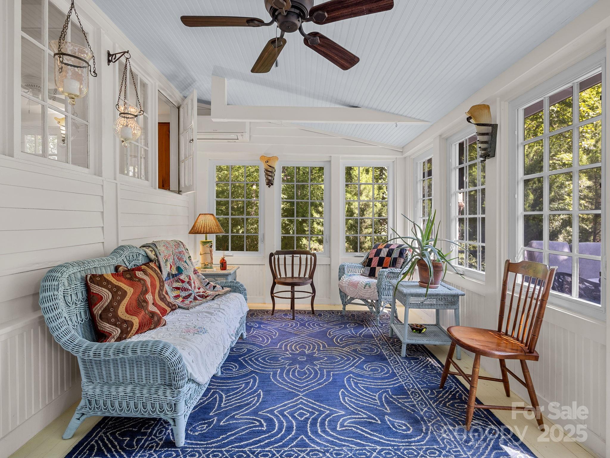 144 Miller Drive Tryon, NC 28782 - Photo 14 of 45 a living room with furniture and a large window
