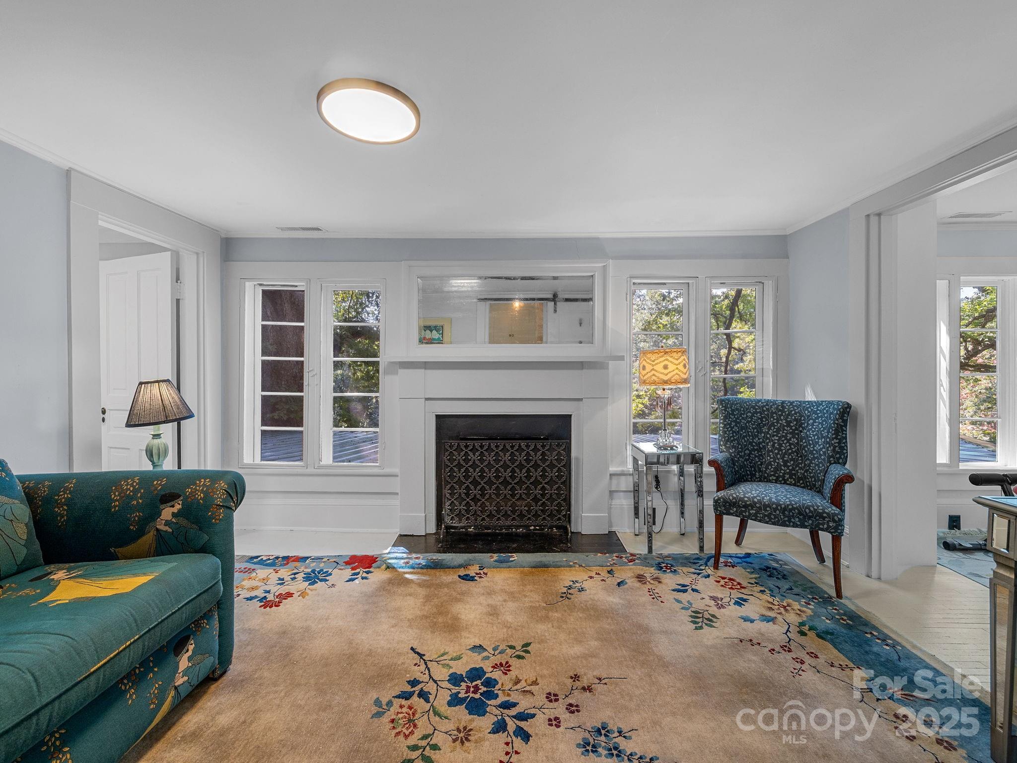 144 Miller Drive Tryon, NC 28782 - Photo 16 of 45 a living room with furniture and a fireplace