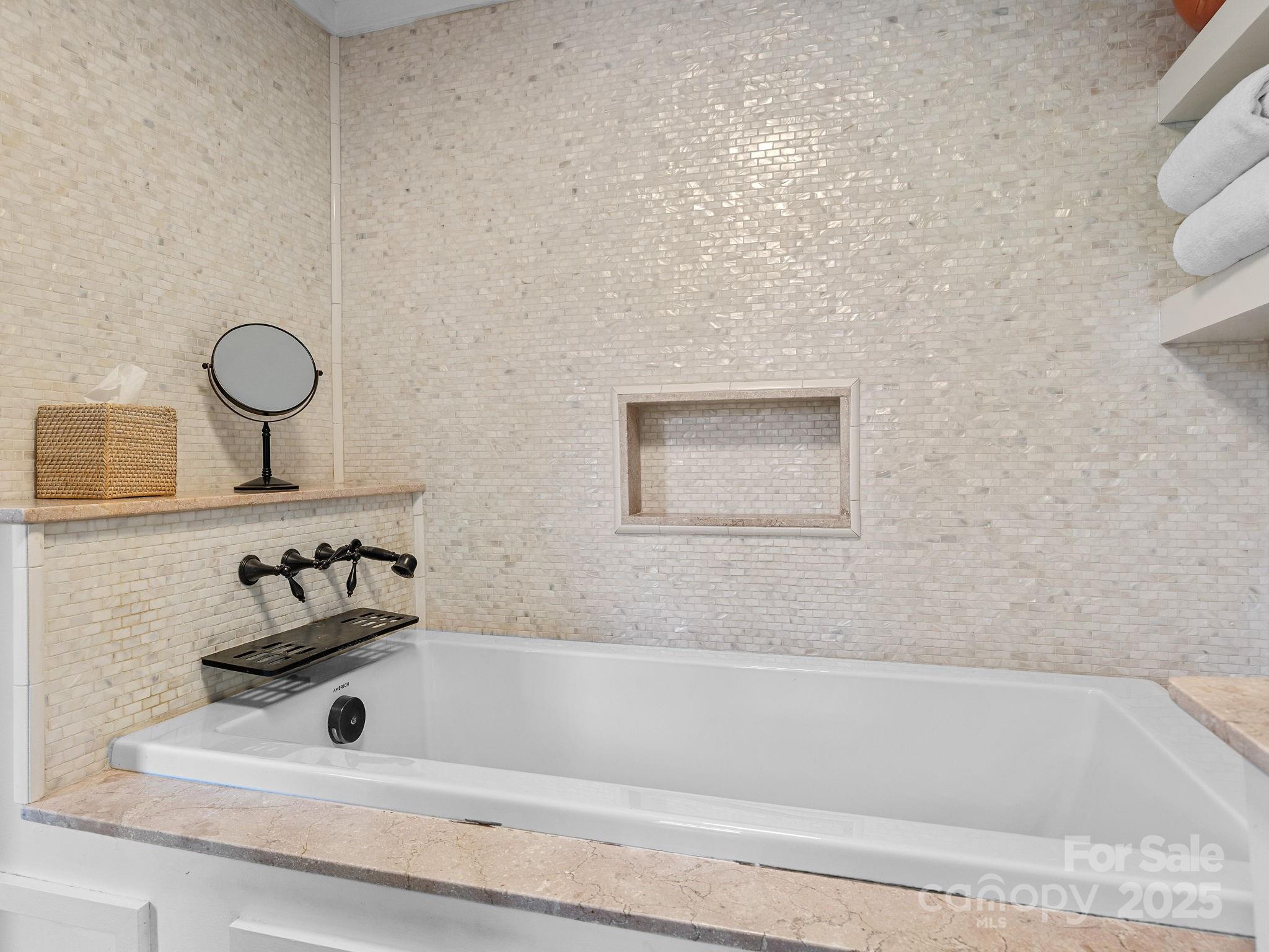 144 Miller Drive Tryon, NC 28782 - Photo 20 of 45 a bathroom with a sink and a bathtub