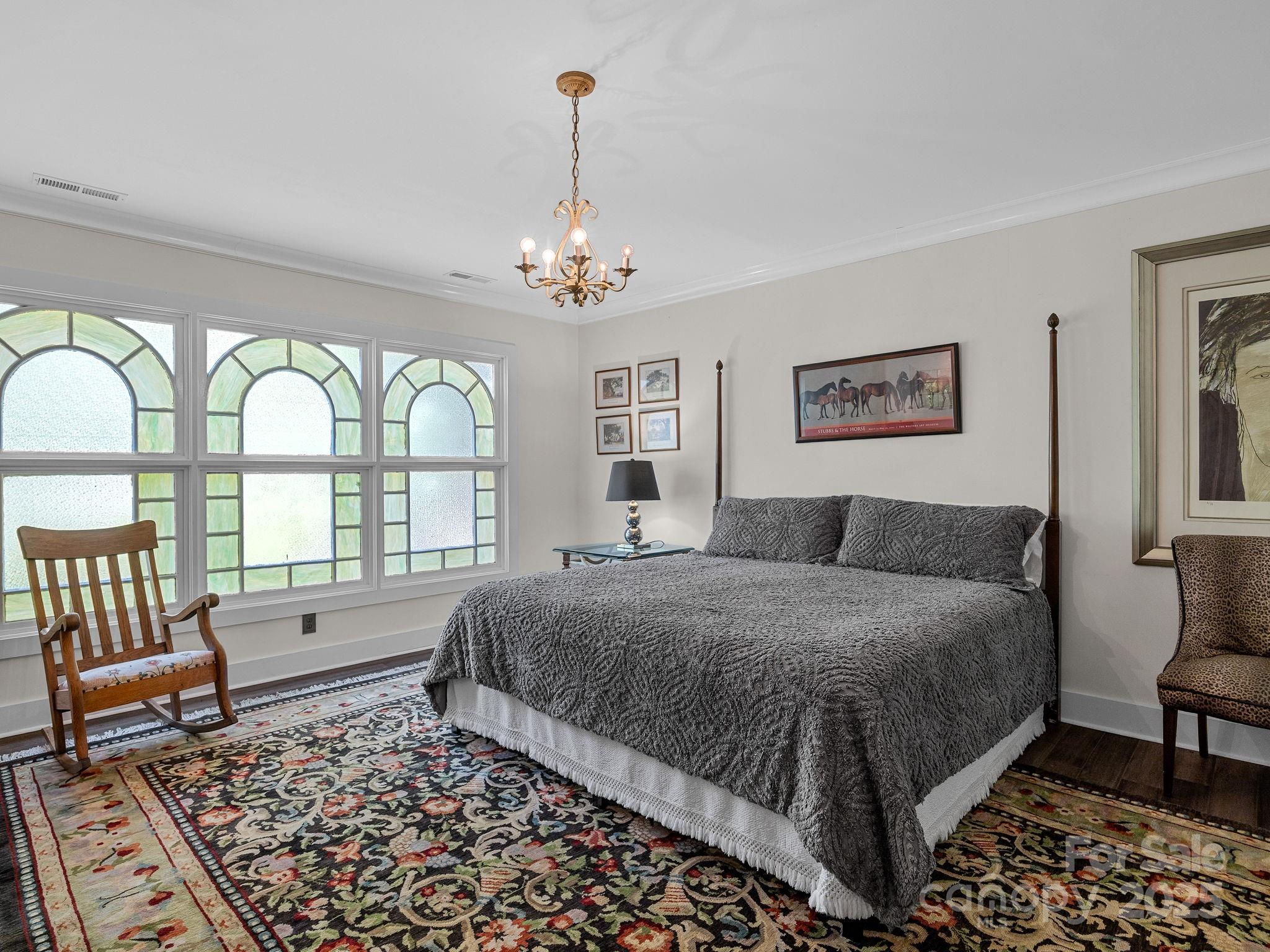144 Miller Drive Tryon, NC 28782 - Photo 35 of 45 a spacious bedroom with a bed and window