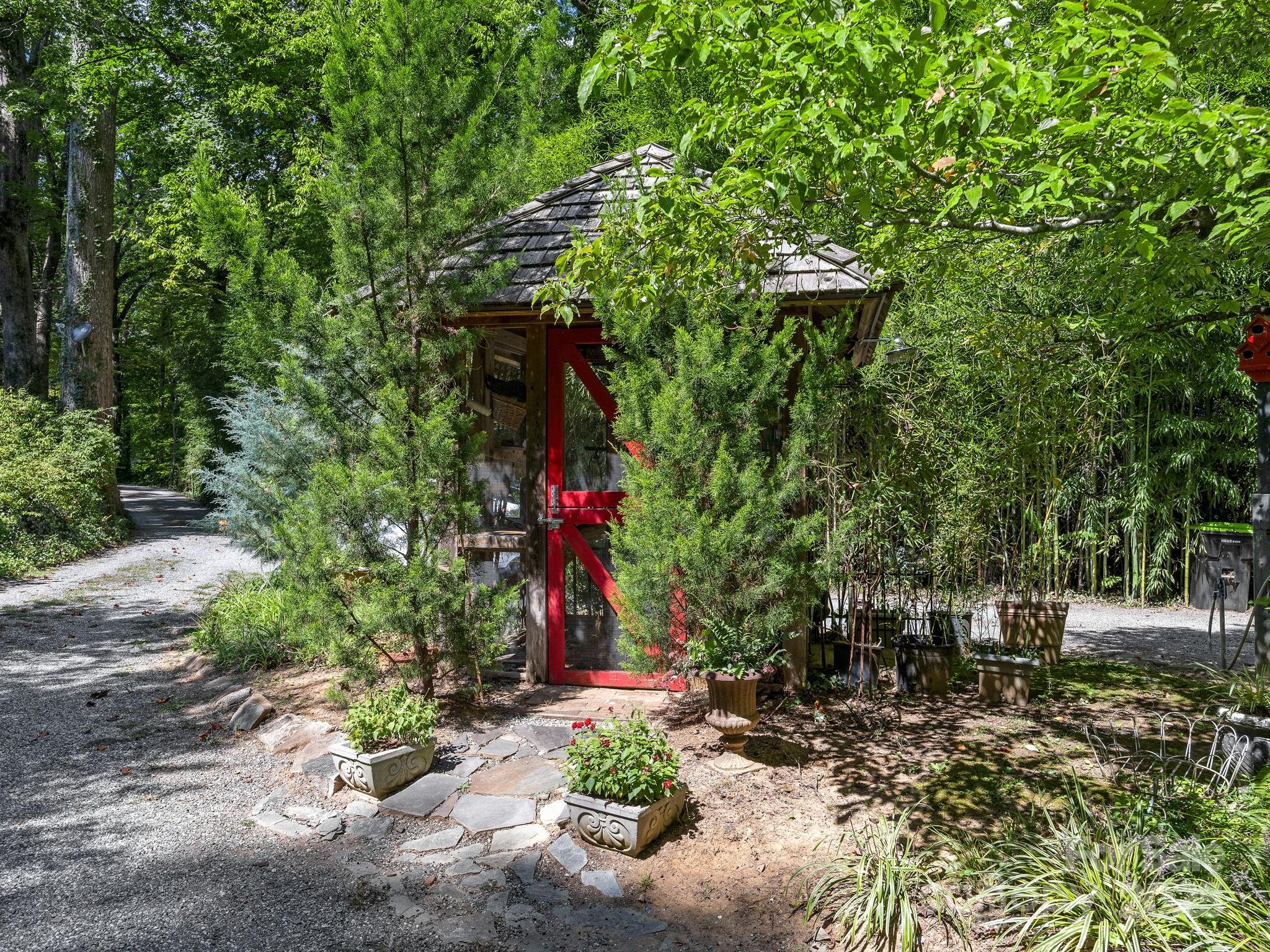 144 Miller Drive Tryon, NC 28782 - Photo 40 of 45 a front view of a house with plants