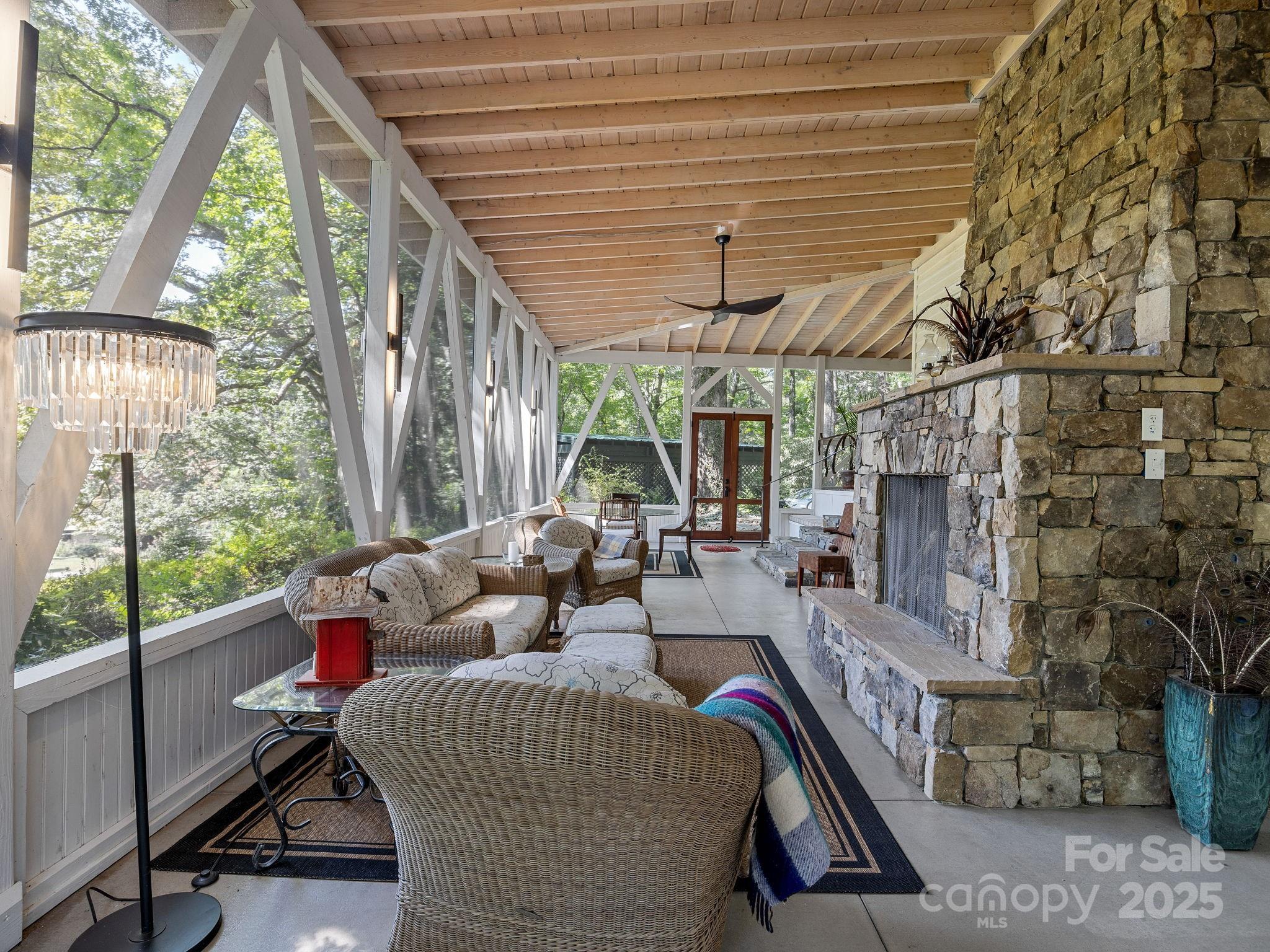 144 Miller Drive Tryon, NC 28782 - Photo 6 of 45 a living room with furniture and a flat screen tv