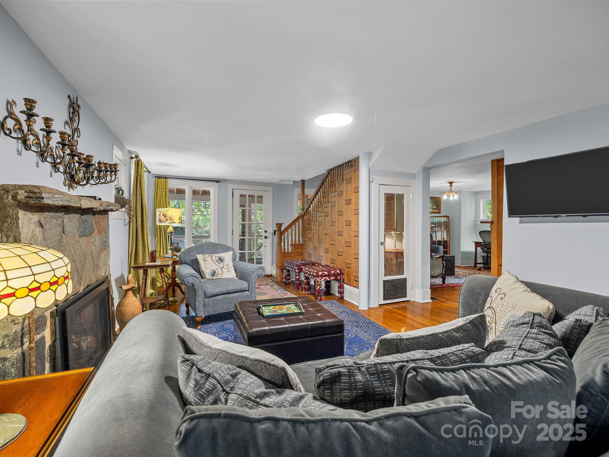144 Miller Drive Tryon, NC 28782 - Photo 9 of 45 a living room with furniture and a flat screen tv