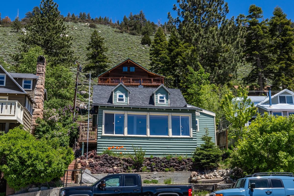 2693 Highway 158 June Lake, CA 93529 - Photo 1 of 31 a front view of a house with a yard
