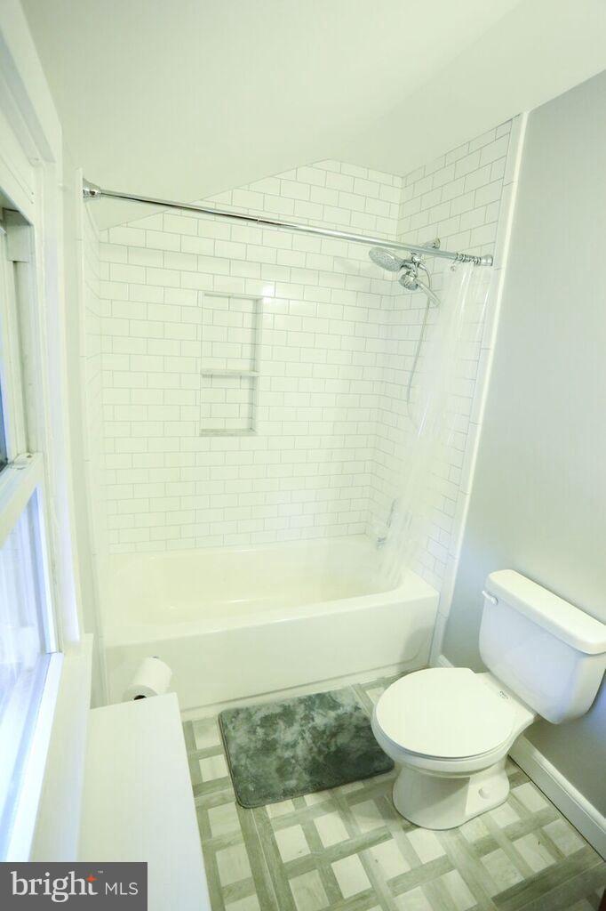 415 Greenwood Road Linthicum, MD 21090 - Photo 20 of 22 a bathroom with a toilet and a shower