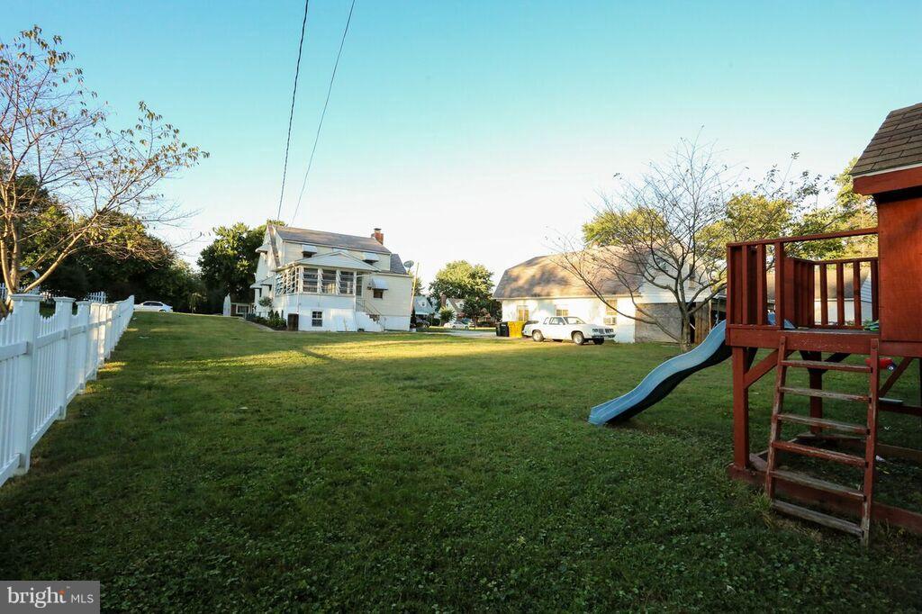 415 Greenwood Road Linthicum, MD 21090 - Photo 3 of 22 a view of a house with a park