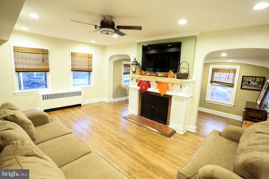 415 Greenwood Road Linthicum, MD 21090 - Photo 5 of 22 a living room with furniture and a flat screen tv