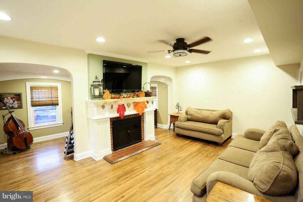 415 Greenwood Road Linthicum, MD 21090 - Photo 6 of 22 a living room with furniture and a flat screen tv