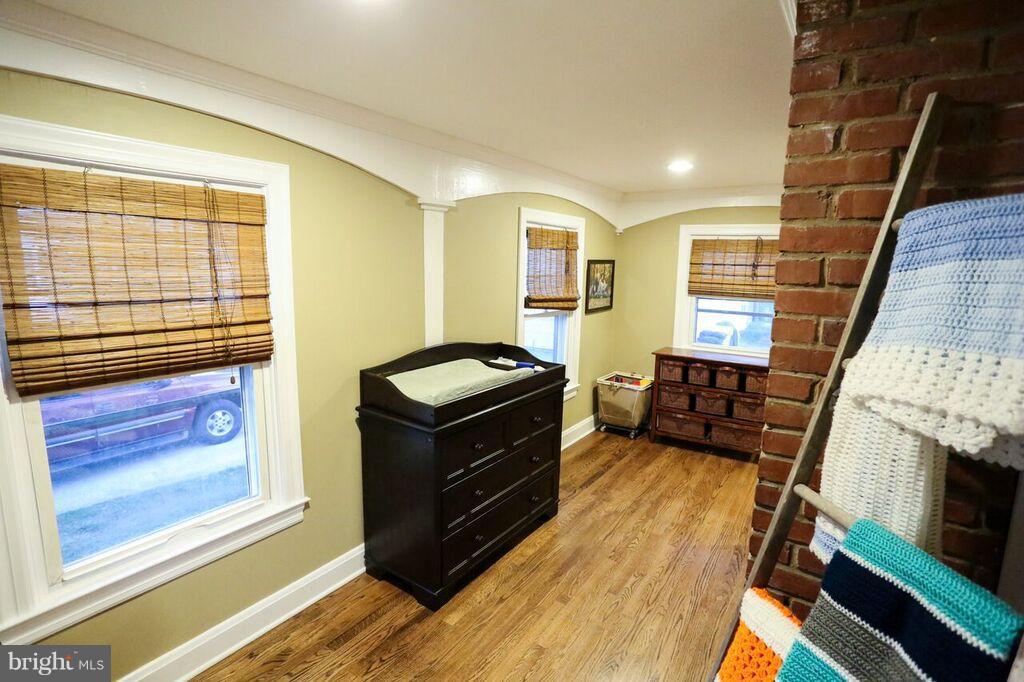 415 Greenwood Road Linthicum, MD 21090 - Photo 7 of 22 a view of a livingroom with furniture and staircase