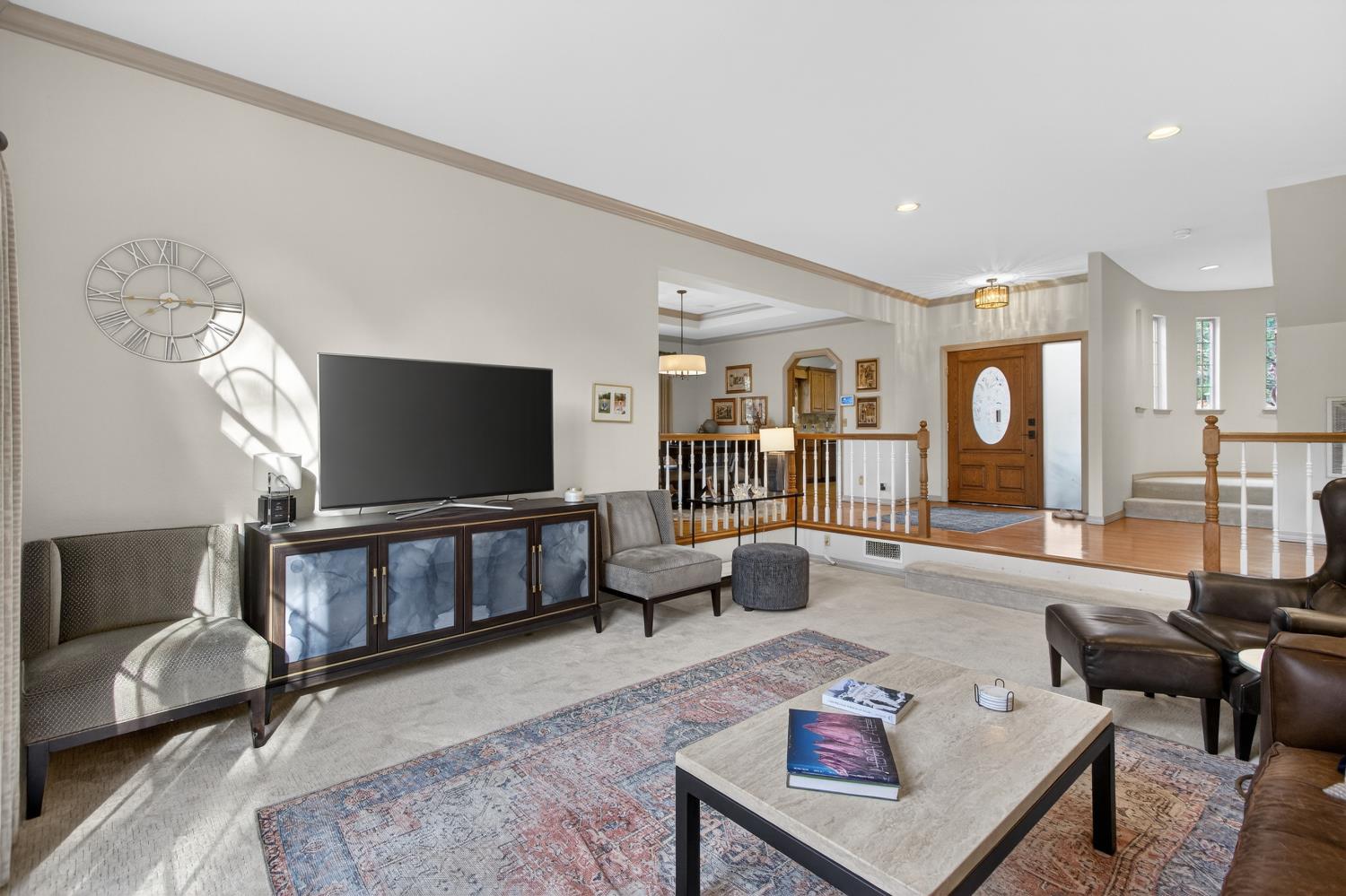 8681 Winding Way Fair Oaks, CA 95628 - Photo 12 of 87 a living room with furniture and a flat screen tv