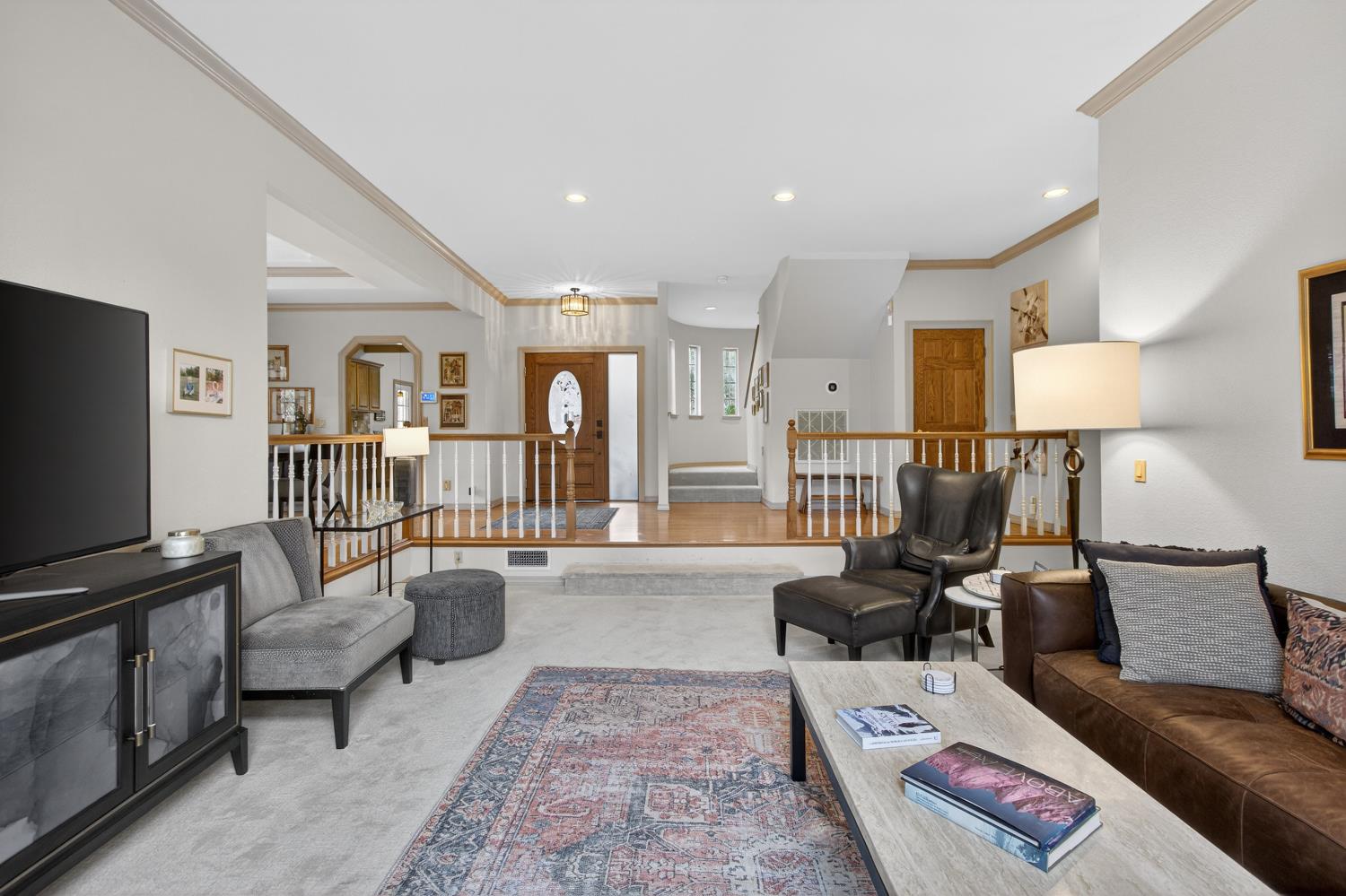 8681 Winding Way Fair Oaks, CA 95628 - Photo 15 of 87 a living room with furniture and a flat screen tv