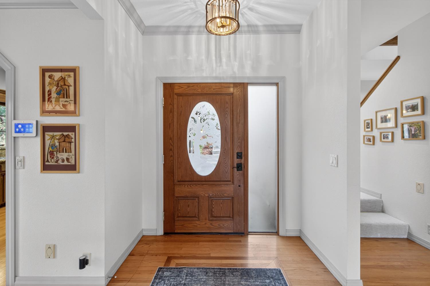 8681 Winding Way Fair Oaks, CA 95628 - Photo 17 of 87 a view of entryway with wooden floor
