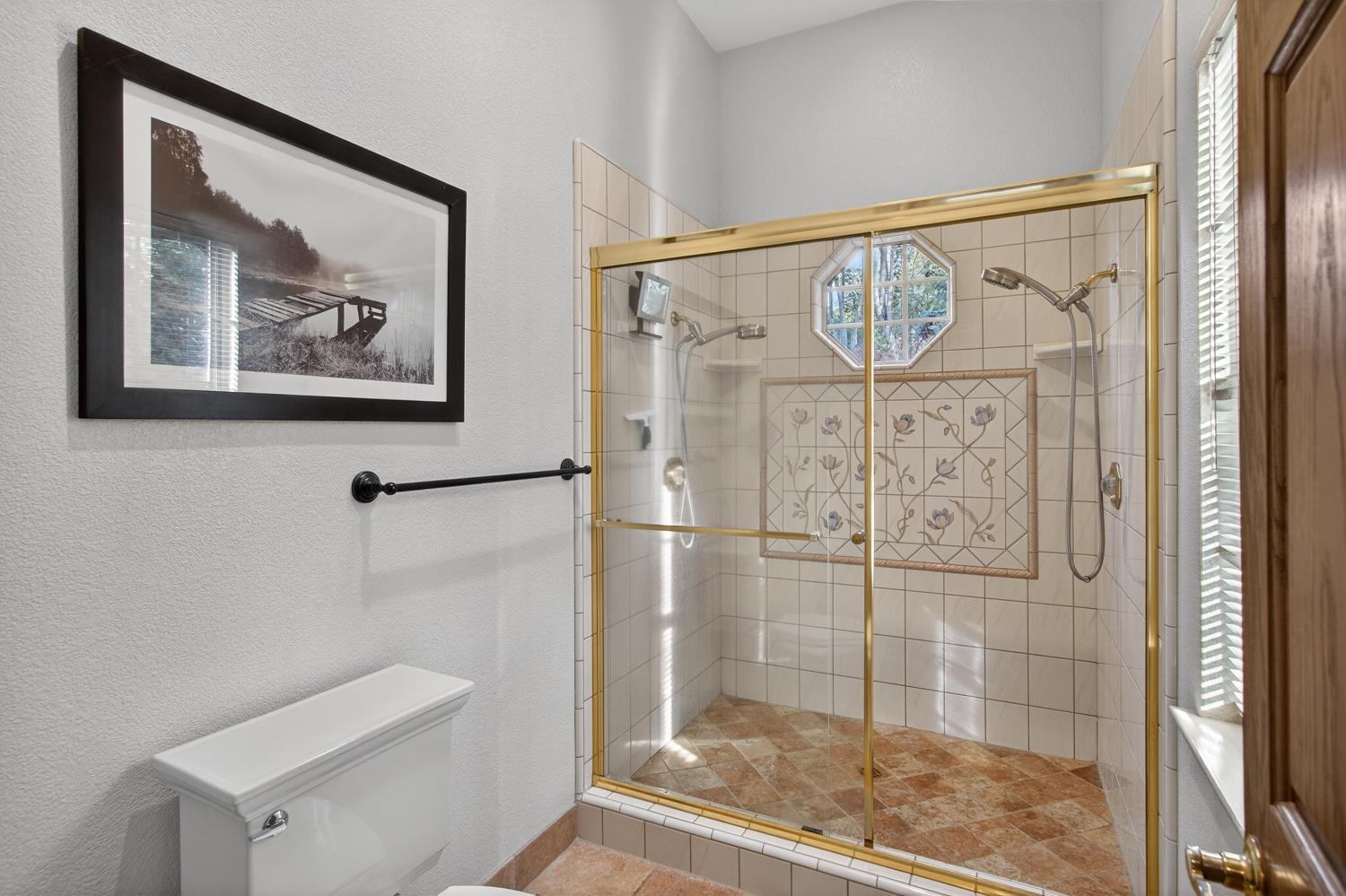 8681 Winding Way Fair Oaks, CA 95628 - Photo 38 of 87 a bathroom with a shower and a sink