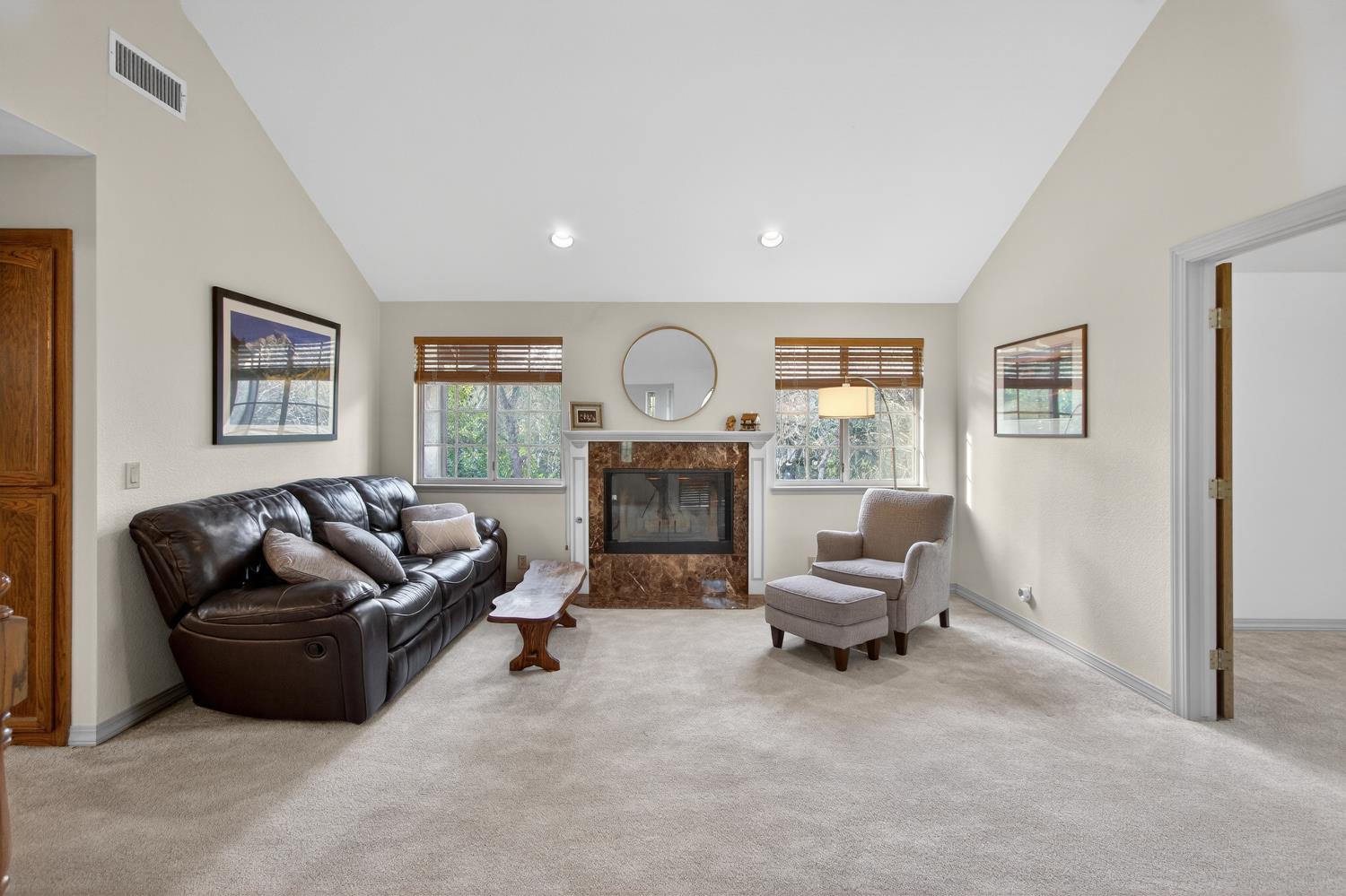 8681 Winding Way Fair Oaks, CA 95628 - Photo 45 of 87 a living room with furniture and a fireplace