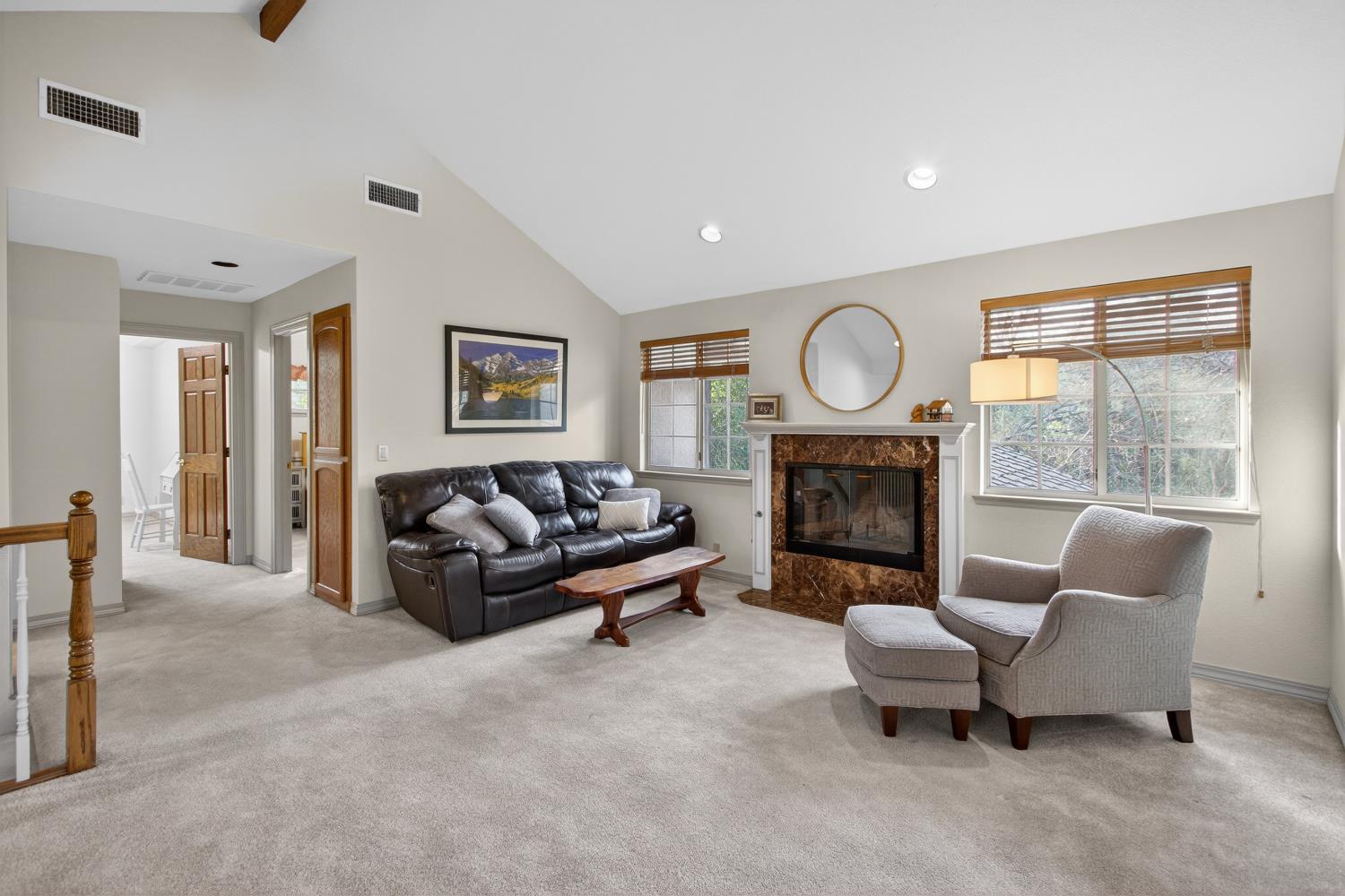 8681 Winding Way Fair Oaks, CA 95628 - Photo 47 of 87 a living room with furniture and a fireplace