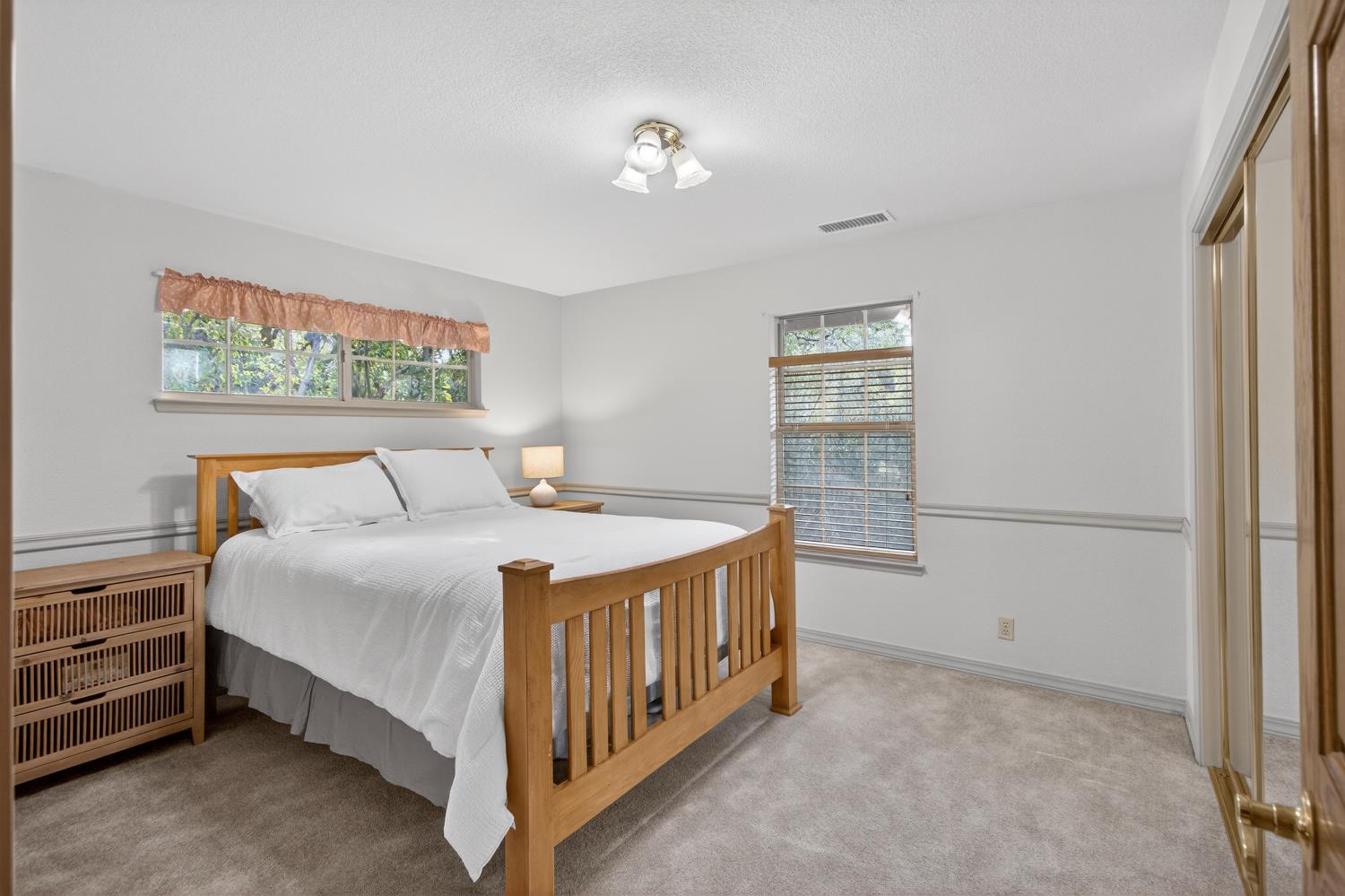 8681 Winding Way Fair Oaks, CA 95628 - Photo 55 of 87 a bed room with a bed and a window