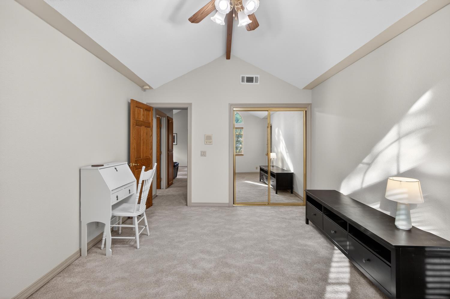 8681 Winding Way Fair Oaks, CA 95628 - Photo 58 of 87 a living room with furniture and a chandelier