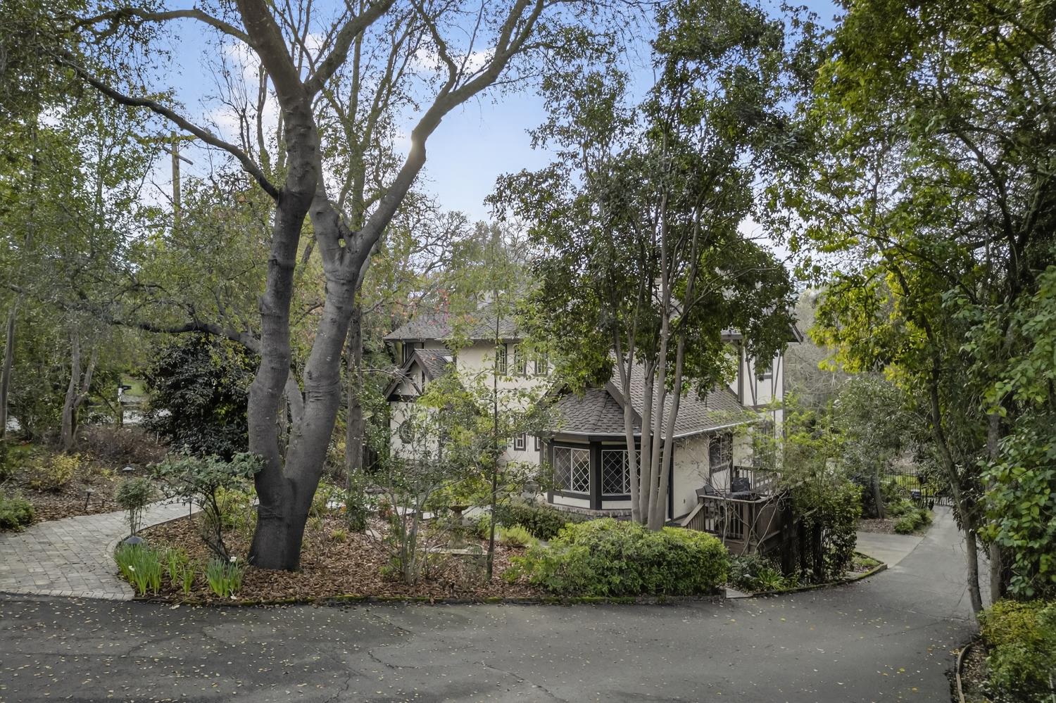 8681 Winding Way Fair Oaks, CA 95628 - Photo 85 of 87 front view of a house with a garden