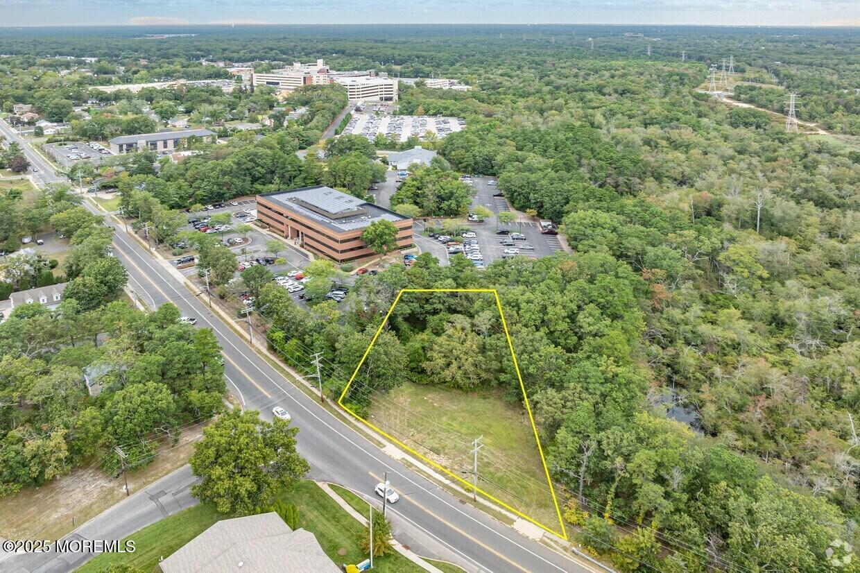 354 Lakehurst Road Toms River, NJ 08755 - Photo 2 of 28 a view of a city from a balcony