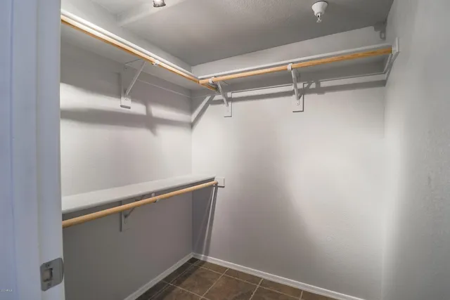a view of an empty walk in closet