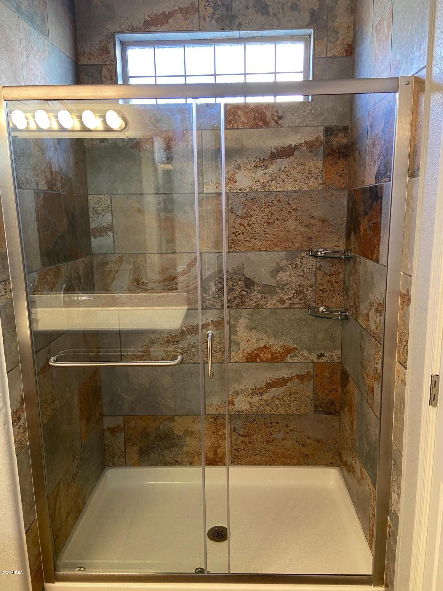 16825 North 14th Street, Unit 45 Phoenix, AZ 85022 - Photo 18 of 35 a bathroom with a shower