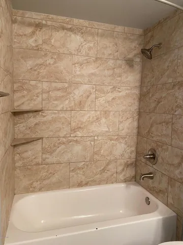 a bathroom with a bathtub