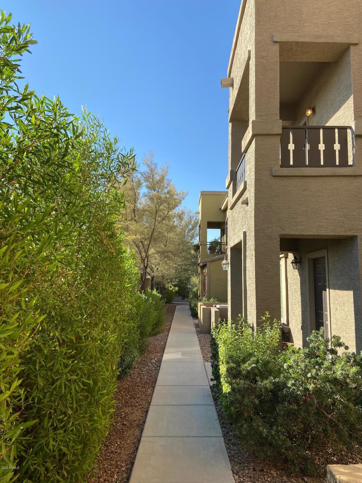 16825 North 14th Street, Unit 45 Phoenix, AZ 85022 - Photo 31 of 35 a view of a pathway both side of the house