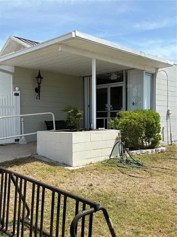 a view of a house with a ocean view
