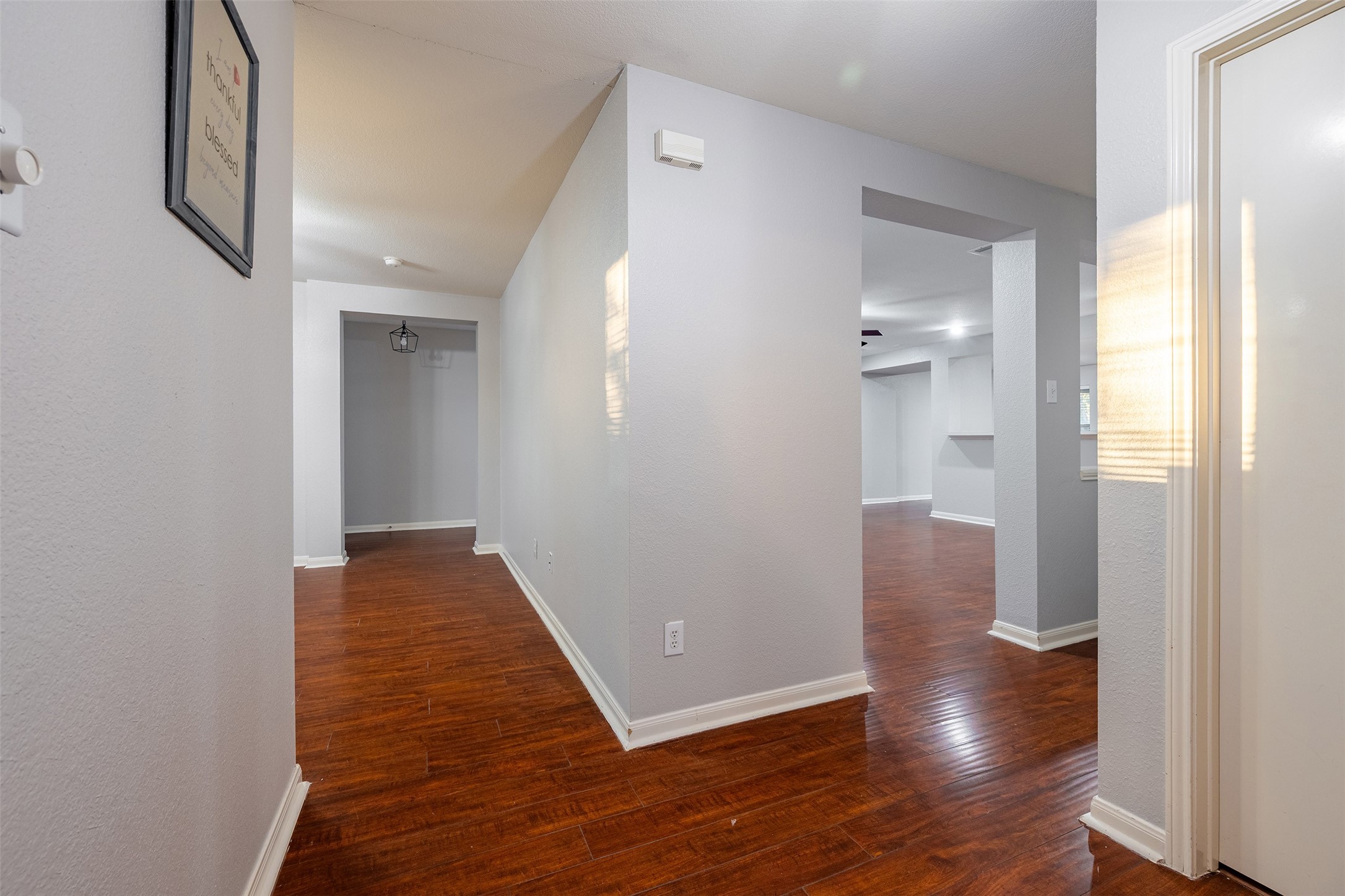 15823 Kings Cypress Lane Cypress, TX 77429 - Photo 15 of 33 A dedicated, private hallway ensures the three spacious bedrooms are separated from the main living and entertaining areas.