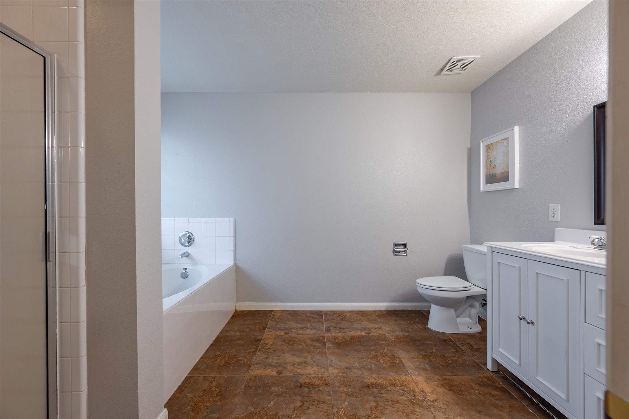 15823 Kings Cypress Lane Cypress, TX 77429 - Photo 19 of 33 The Primary Bath features both a relaxing soaking tub and a separate standing shower.