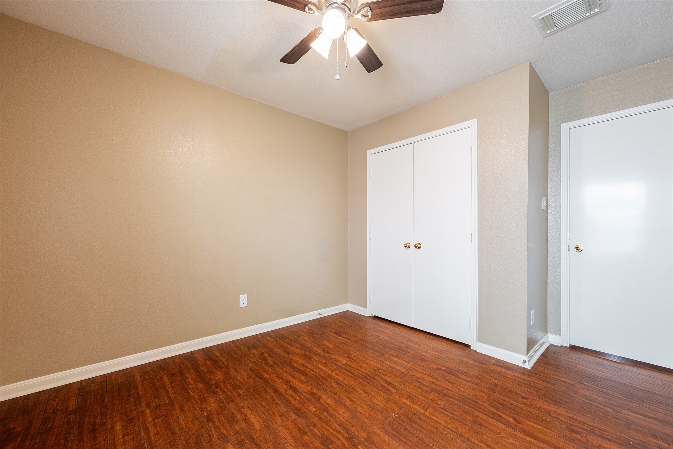 15823 Kings Cypress Lane Cypress, TX 77429 - Photo 23 of 33 Second of two spacious secondary bedrooms, ready for family, guests, or an extra office.