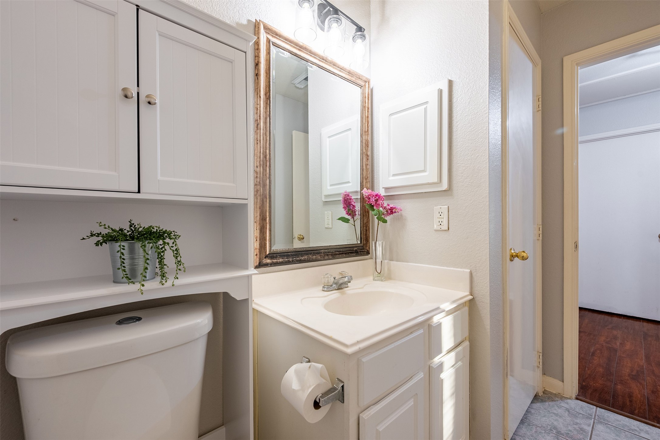 15823 Kings Cypress Lane Cypress, TX 77429 - Photo 26 of 33 Full secondary bathroom featuring a clean tub/shower combo and a convenient extra linen closet, conveniently located near the secondary bedrooms.
