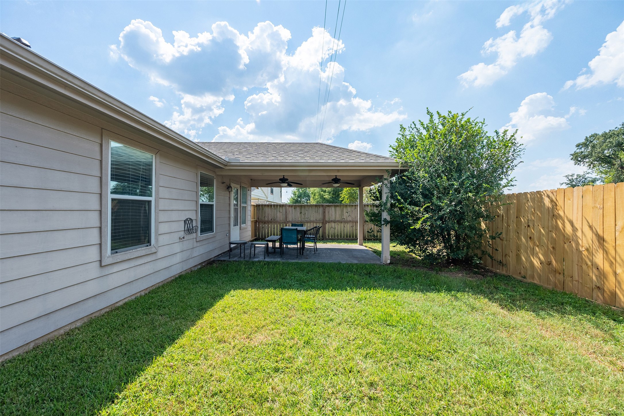 15823 Kings Cypress Lane Cypress, TX 77429 - Photo 28 of 33 Enjoy a large, fully-fenced backyard that backs up to a serene green space. No back neighbors for maximum privacy!
