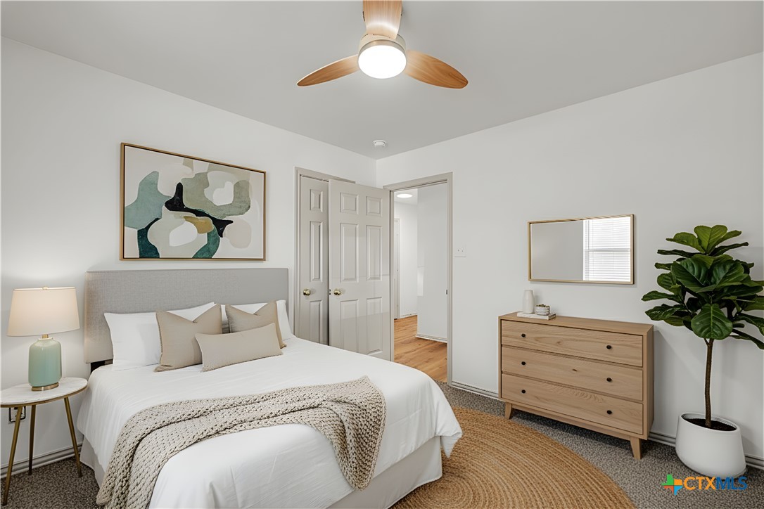 42 Great W Loop Belton, TX 76513 - Photo 7 of 29 a bedroom with a bed and a dresser