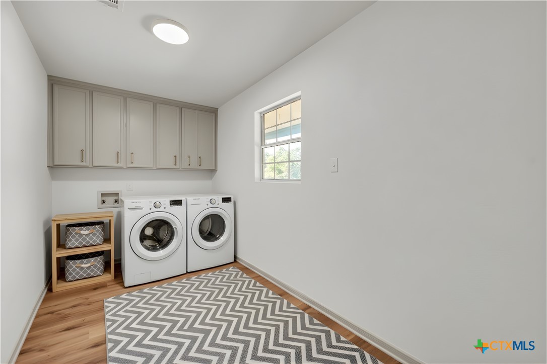 42 Great W Loop Belton, TX 76513 - Photo 9 of 29 a view of a storage and utility room with washer and dryer