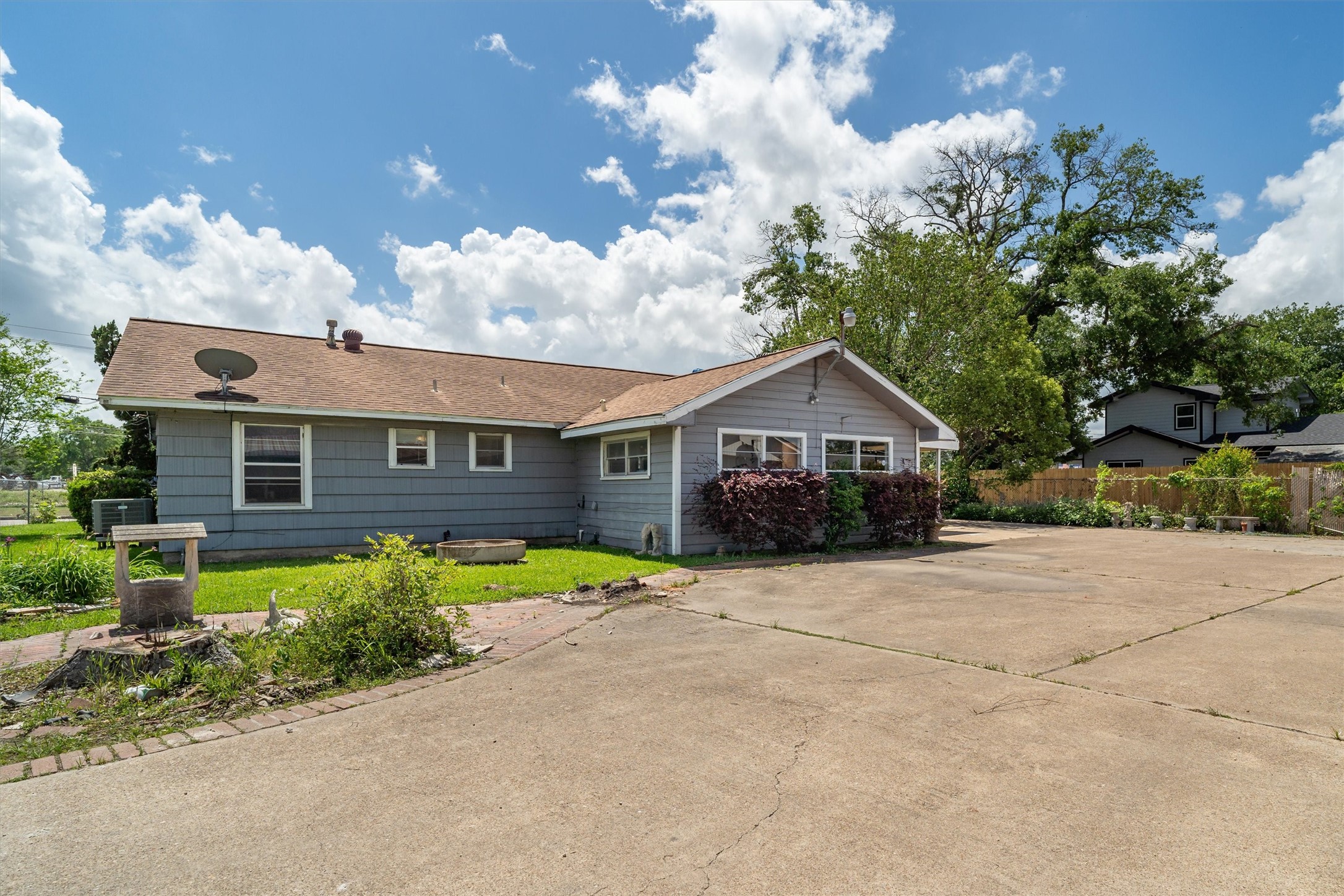 7833 Almeda Genoa Road Houston, TX 77075 - Photo 13 of 21 a front view of a house with a yard and garage
