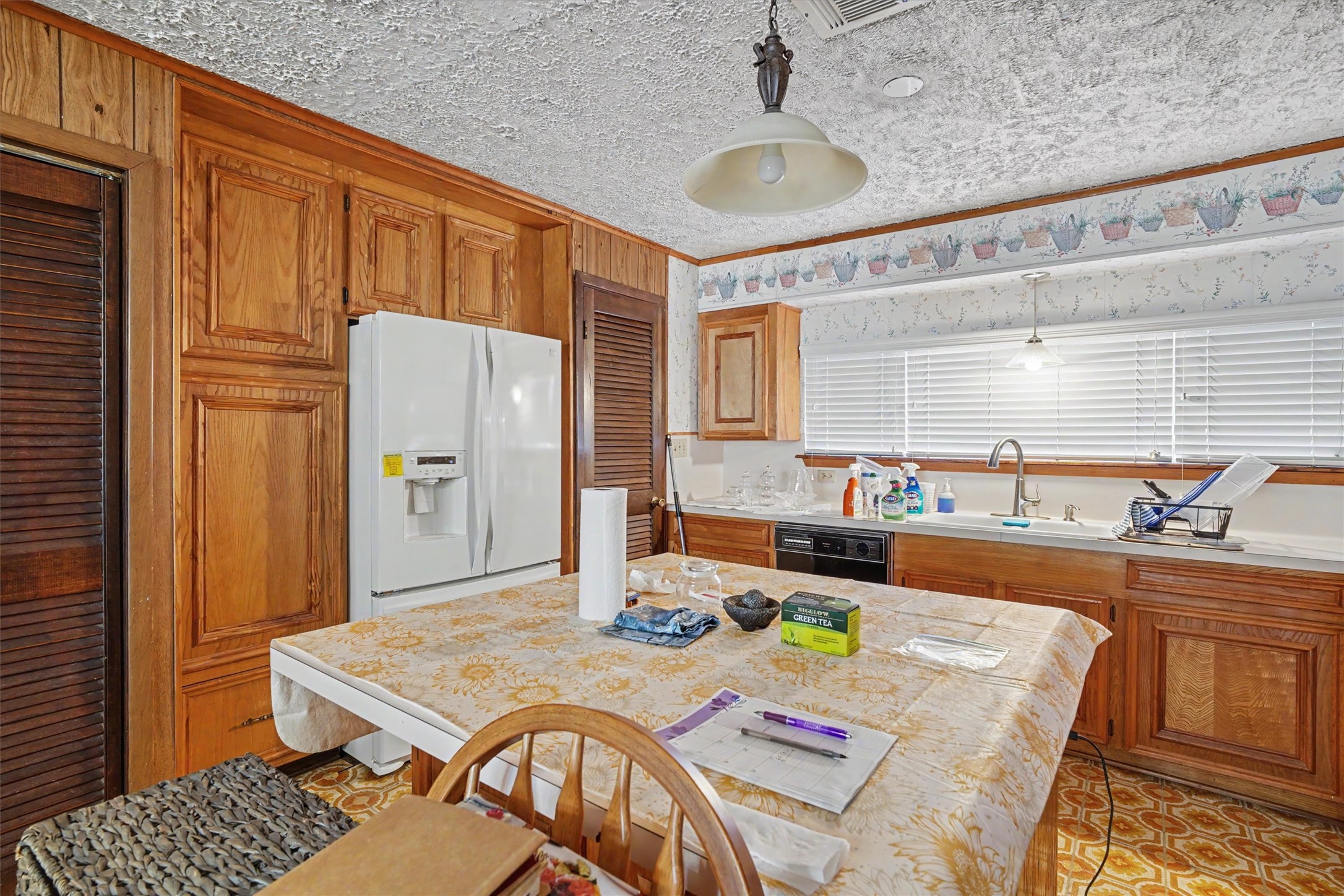 7833 Almeda Genoa Road Houston, TX 77075 - Photo 8 of 21 a kitchen with stainless steel appliances granite countertop a sink and a refrigerator