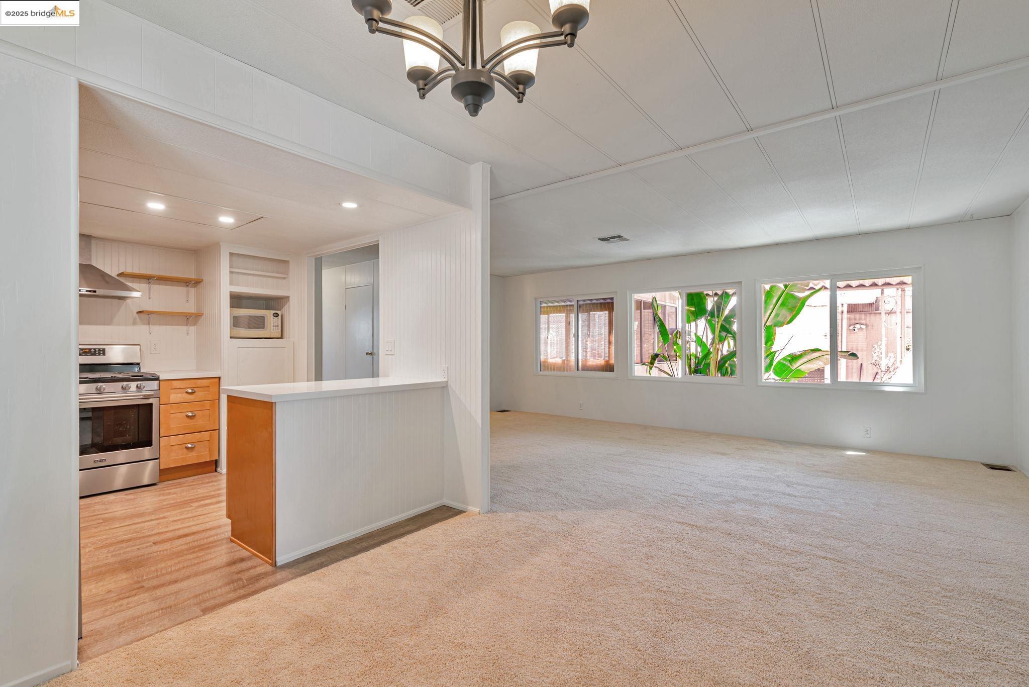 4603 Balfour Road, Unit 58 Brentwood, CA 94513 - Photo 33 of 33 an empty room with windows and entrance