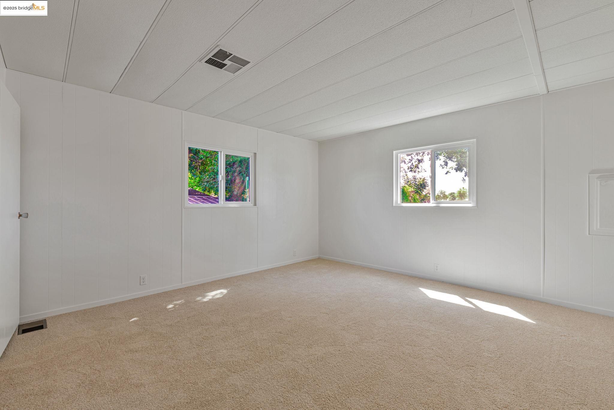 4603 Balfour Road, Unit 58 Brentwood, CA 94513 - Photo 14 of 33 an empty room with windows