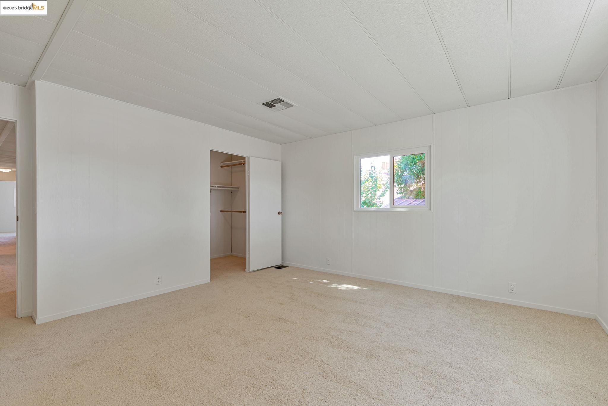 4603 Balfour Road, Unit 58 Brentwood, CA 94513 - Photo 15 of 33 a view of an empty room with a window