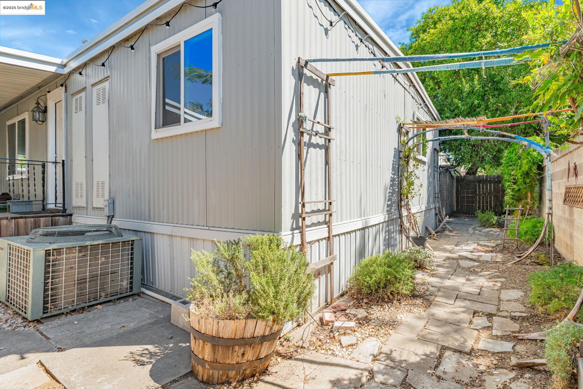 4603 Balfour Road, Unit 58 Brentwood, CA 94513 - Photo 30 of 33 a view of a house with backyard