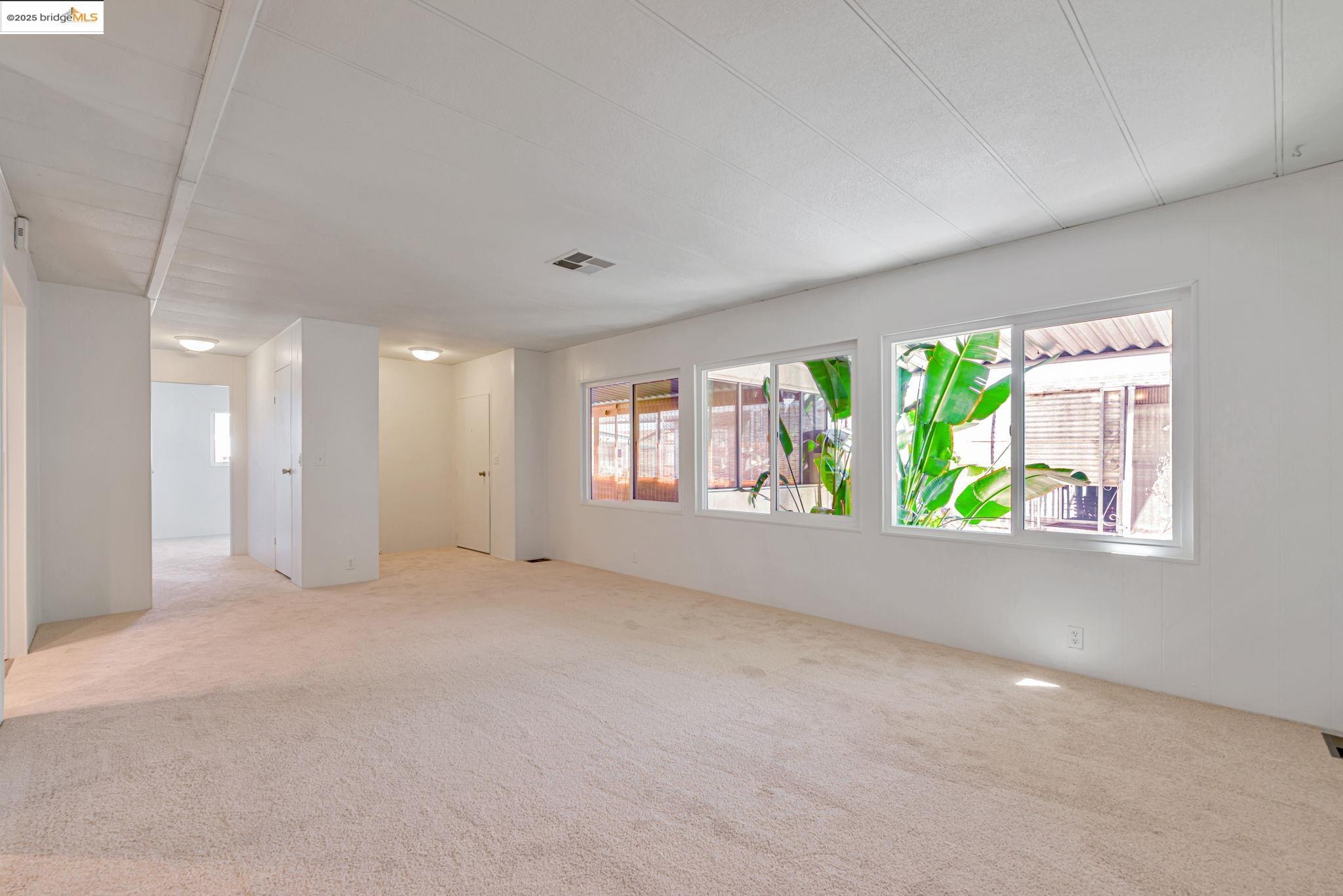 4603 Balfour Road, Unit 58 Brentwood, CA 94513 - Photo 5 of 33 a view of an empty room with a window