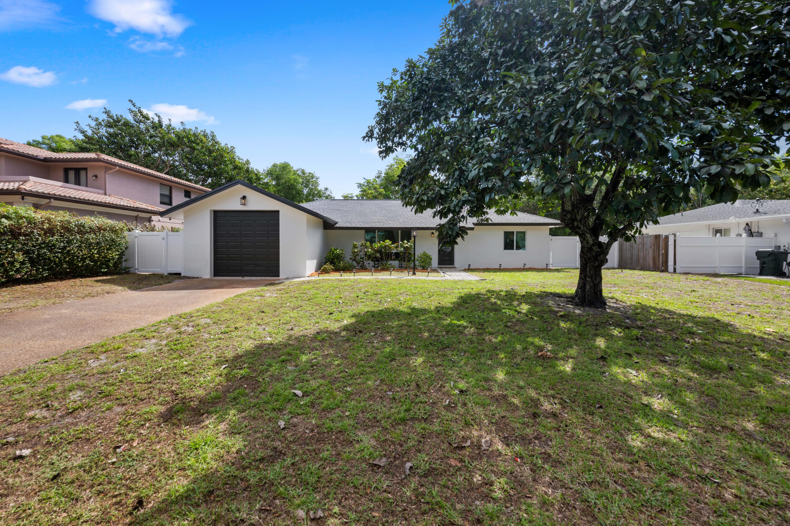 632 East Conference Drive Boca Raton, FL 33486 - Photo 1 of 30 Front of home