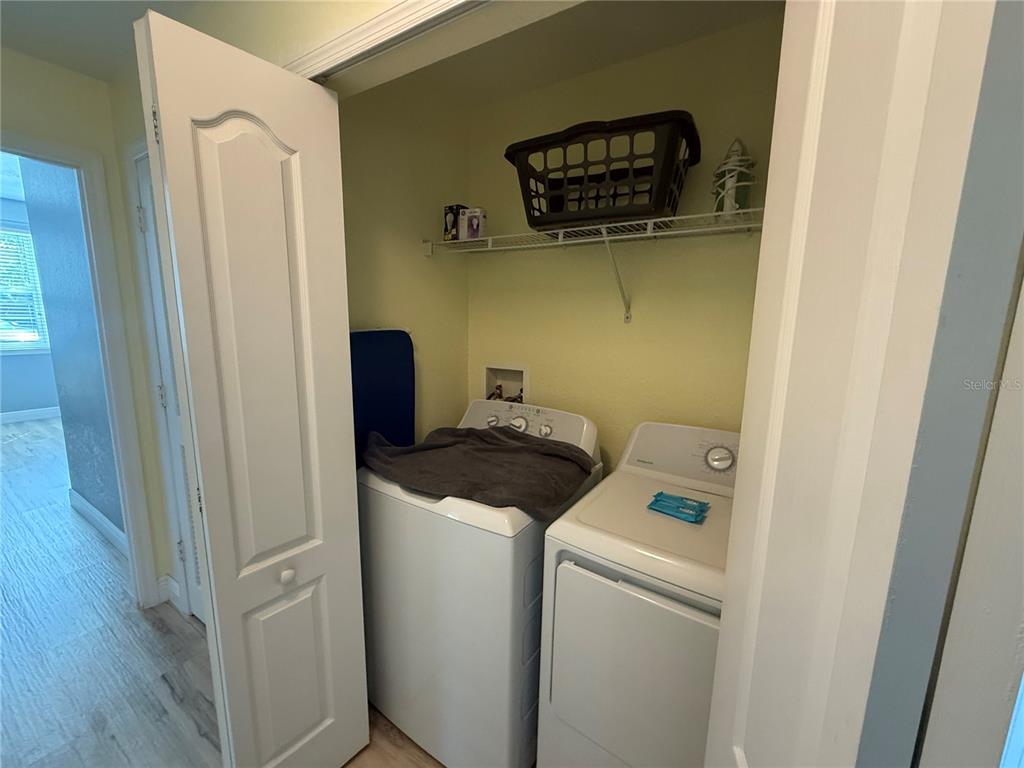 3006 Bonfire Beach Drive, Unit 102 Kissimmee, FL 34746 - Photo 9 of 15 a utility room with dryer and washer
