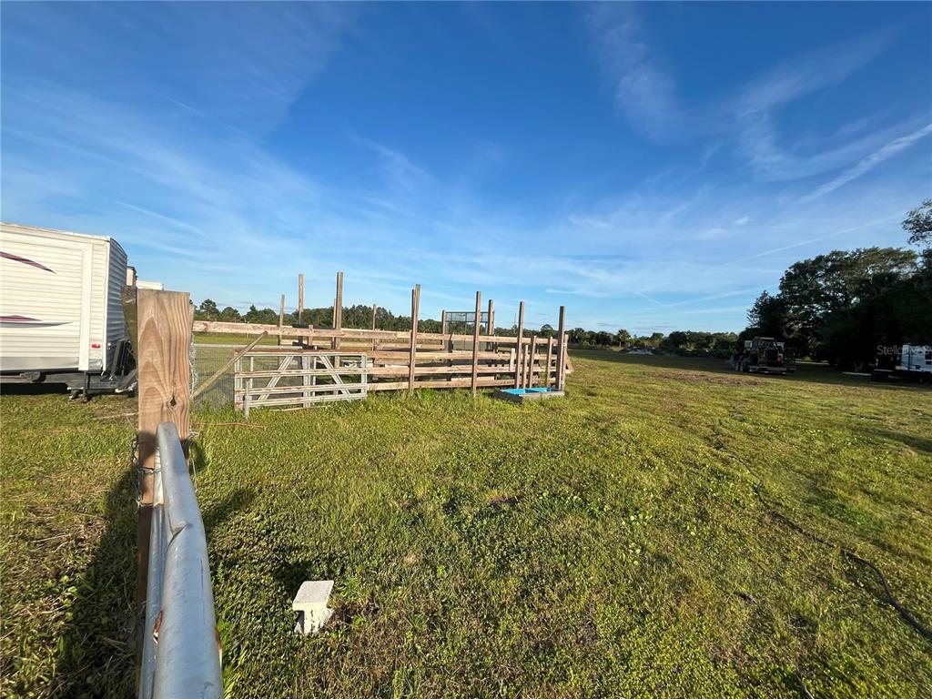 15628 Northwest 310th Street Okeechobee, FL 34972 - Photo 24 of 39 a view of a lake with houses