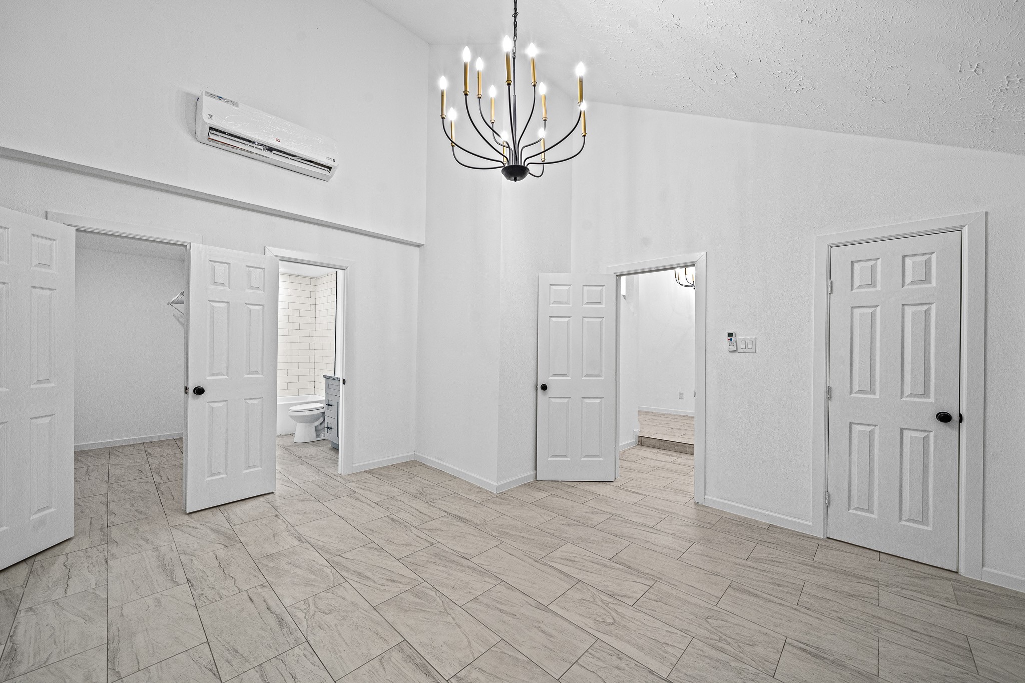 6706 Trigate Drive Houston, TX 77489 - Photo 13 of 40 a view of a chandelier fan and entryway